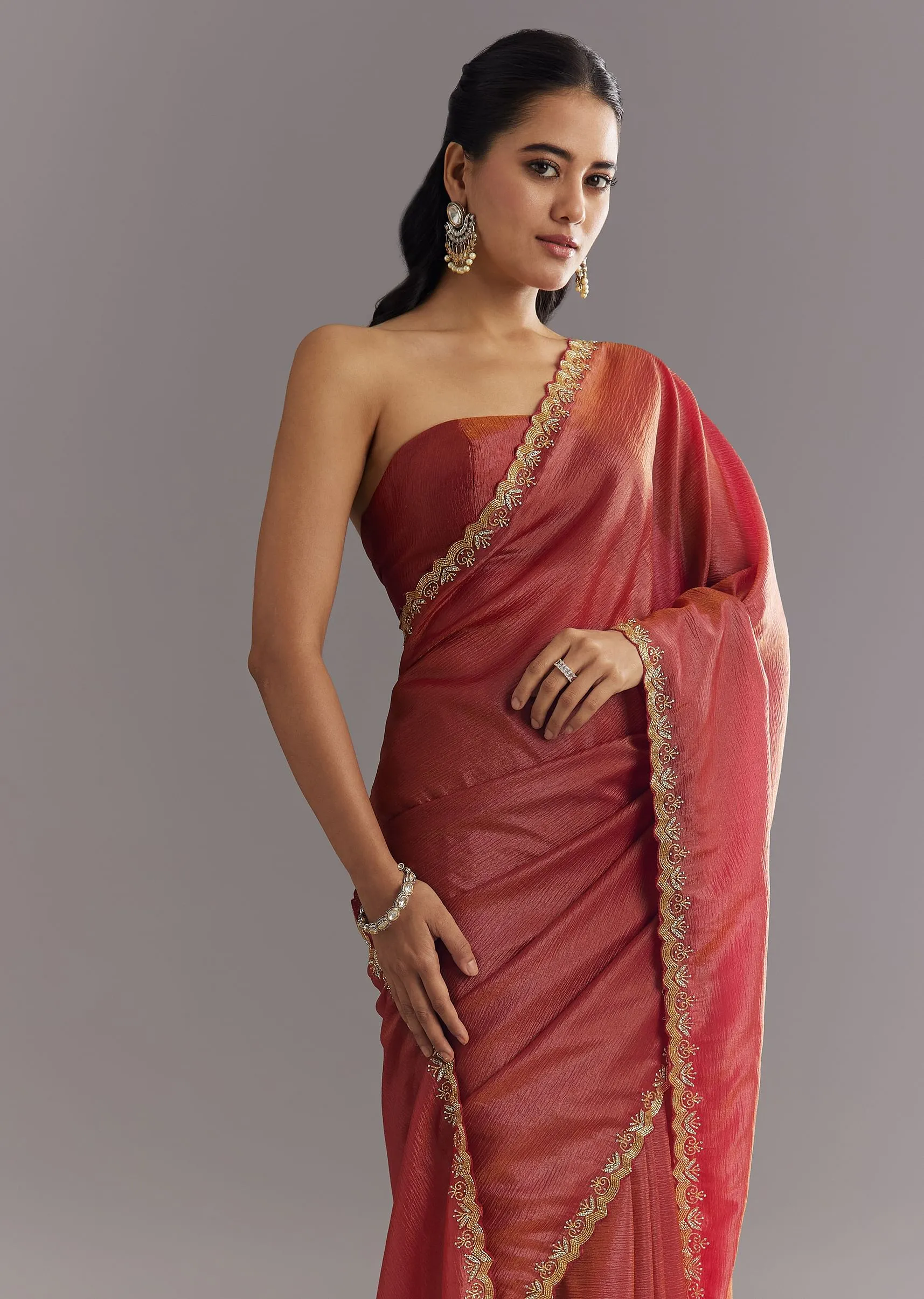Dusky Brown Crushed Tissue Saree With Stones Cutdana Embroidered Scallop Border